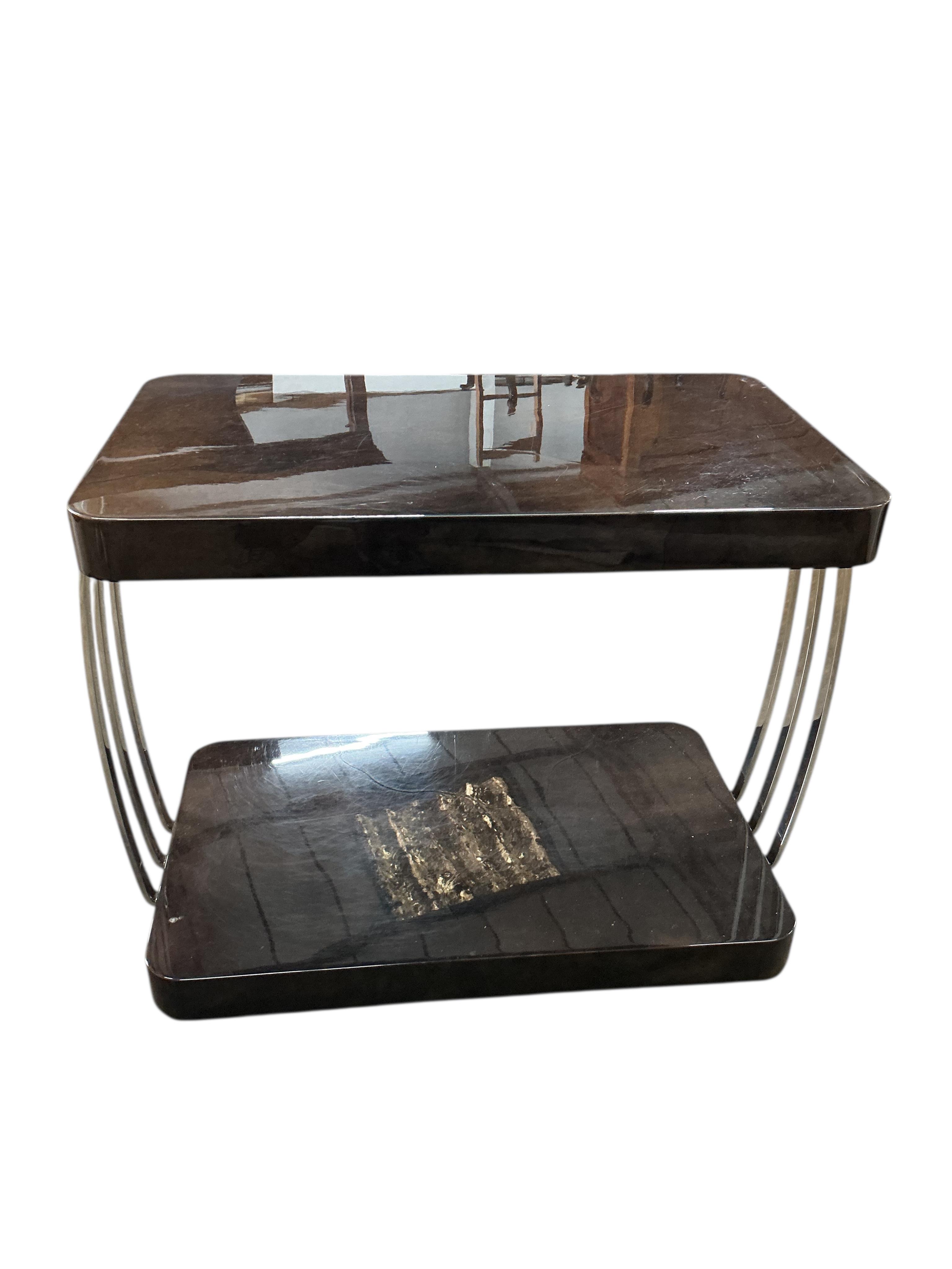 Sally Sirkin Lewis for J Robert Scott, a pair of rectangular Art Deco style lacquer and chrome two tier tables, width 84cm, depth 51cm, height 66cm
